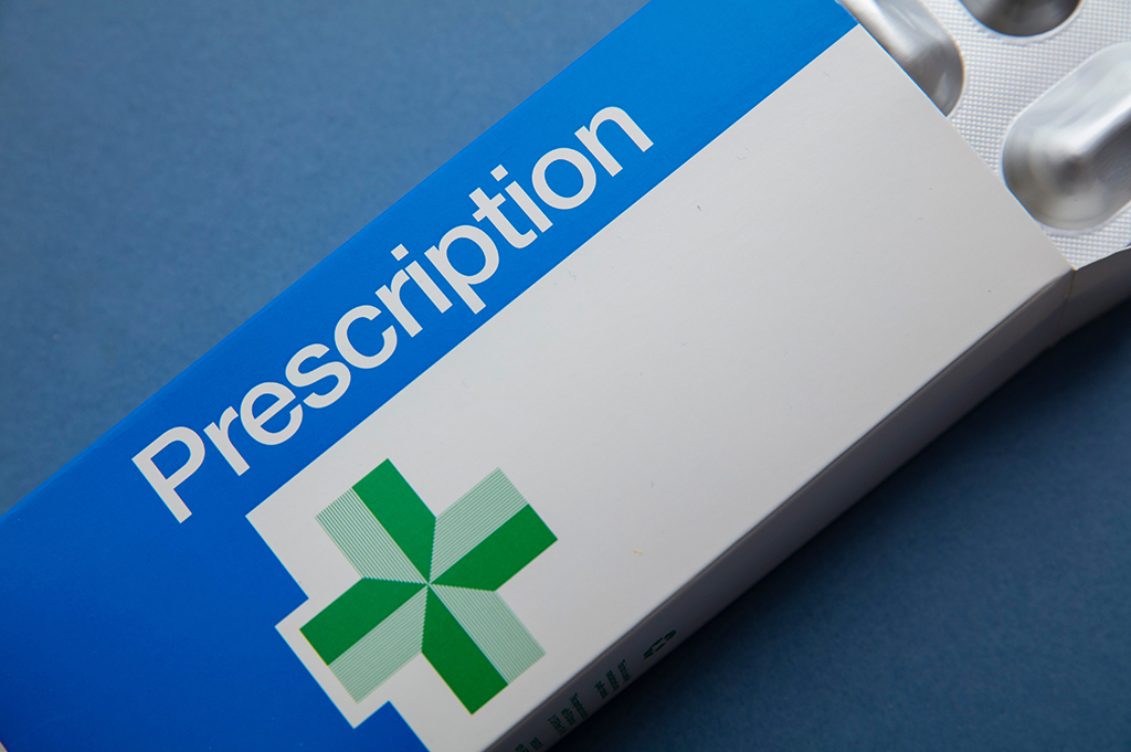 NHS prescription bag on blue background