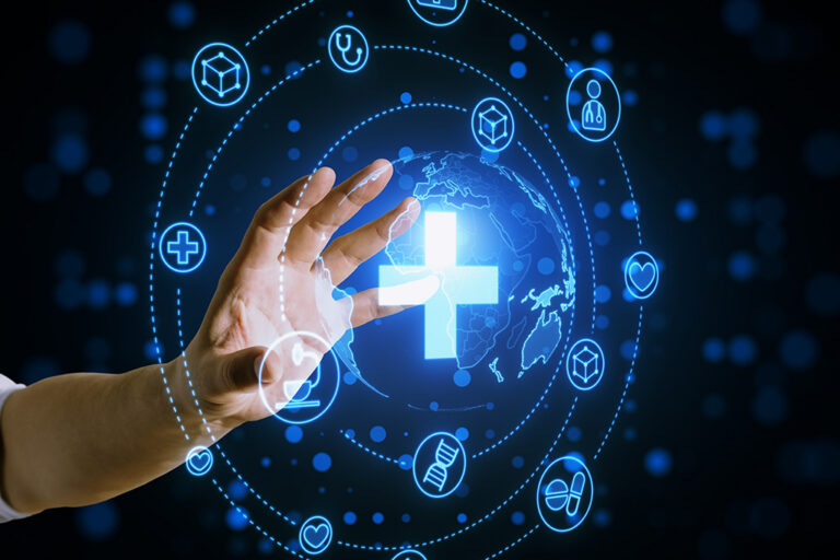 Close up of hand reaching out into creative glowing blue medical hologram with cross, and healthcare symbols