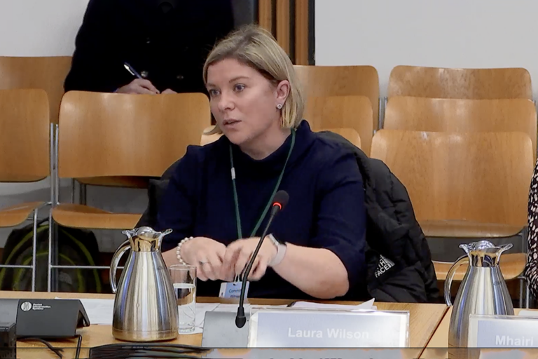 Laura Wilson discusses point in Scottish Parliament