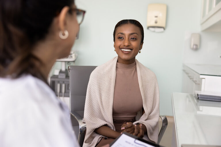Woman patient visiting pharmacy healthcare specialist, listening treatment options, prescribed medications instruction.