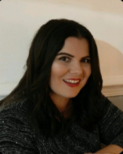 Head and shoulders image of Angharad Morris, member of the ‘Pharmacy: Delivering a Healthier Wales’ delivery board, wearing a black top