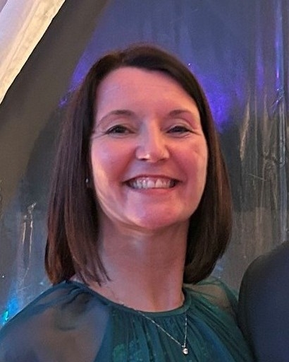 Head and shoulders image of Michelle Sehrawat, member of the ‘Pharmacy: Delivering a Healthier Wales’ delivery board, wearing a green blouse